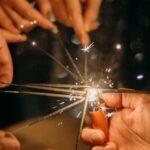 Holidays - People Lighting Sparklers