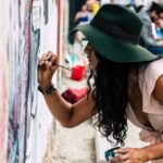 Artists - Photo of Woman Painting on Wall