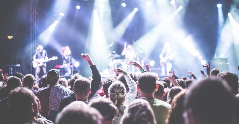 Festival - Crowd in Front of People Playing Musical Instrument during Nighttime