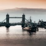 Landmarks - Black Boat Beside Bridge